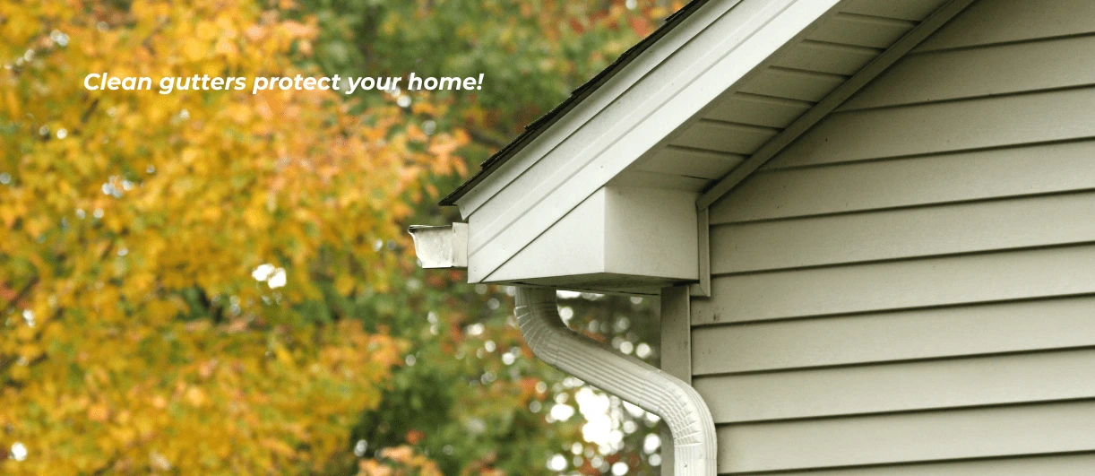 Clean gutters on a house in autumn