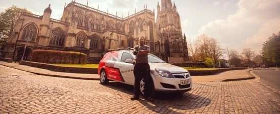 Bens gutters Van in English City with cleaner standing outside