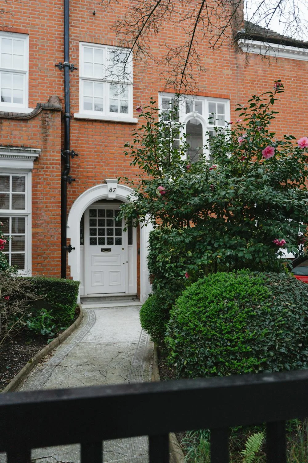 House with clean pathway and downpipe