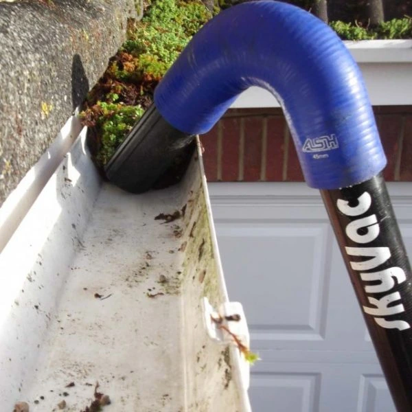 SKYVAC system clearing gutters now clear