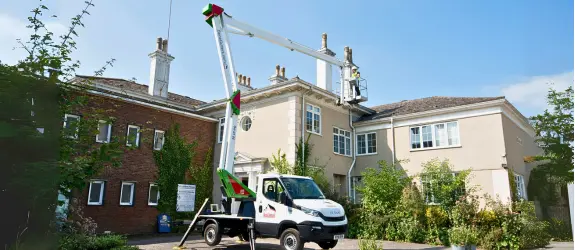 our cherry picker in action for commercial gutter cleaning in Swindon