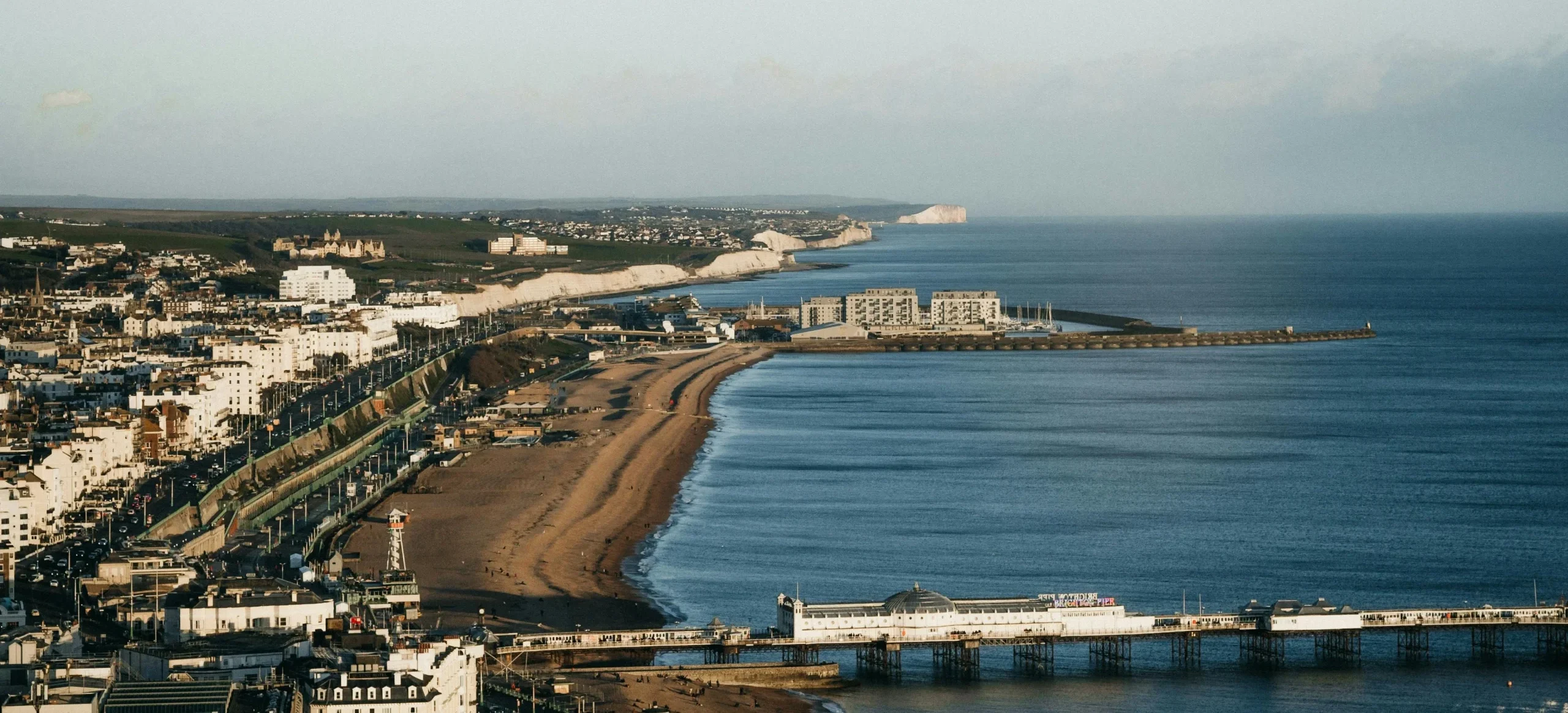 an aerial shot of Brighton's coastal environment providing context of the general surroundings a gutter cleaner is generally dealing with especially with the roofs.