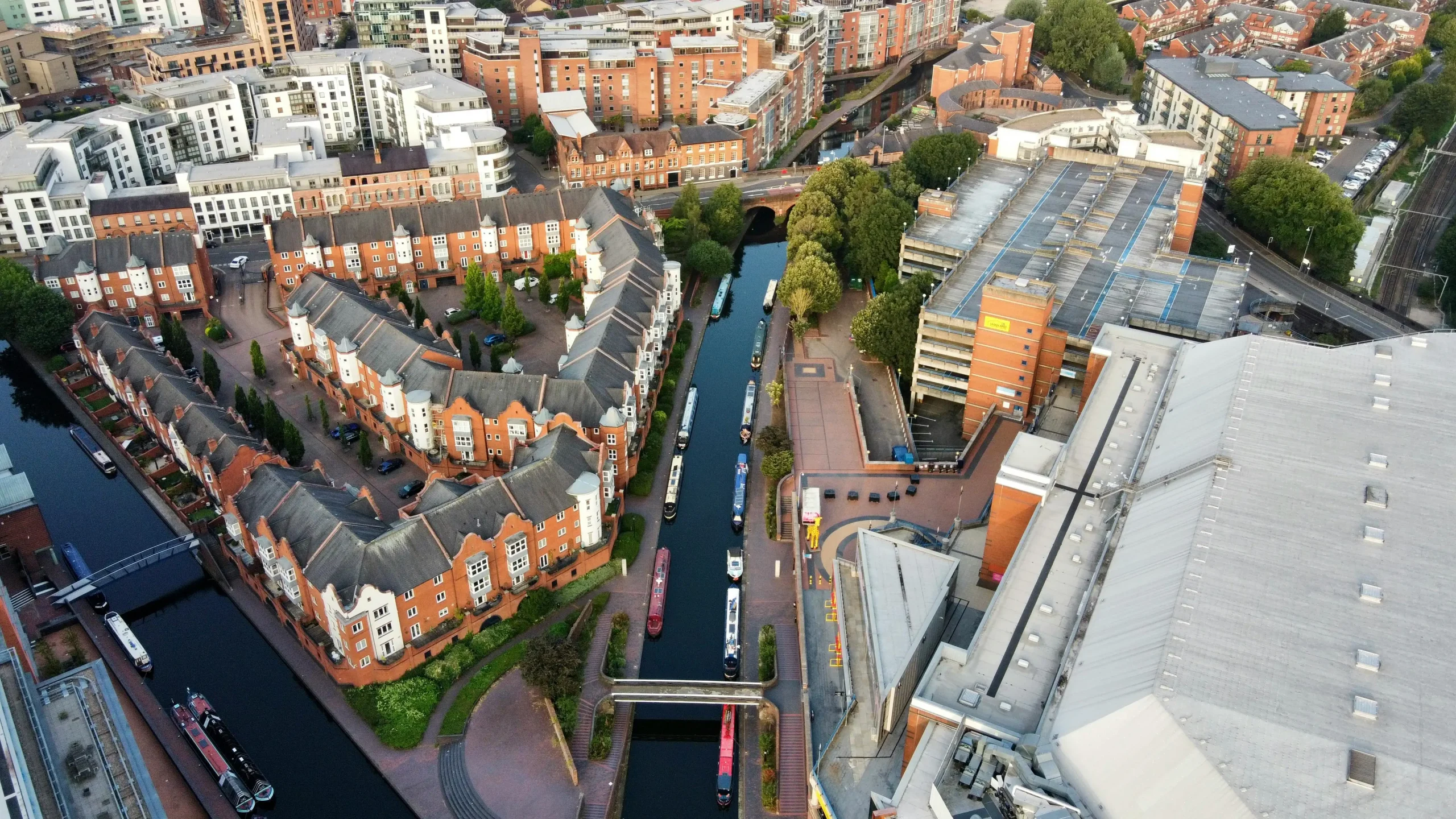 This is a decorative aerial landscape of Birmingham, displaying a collage of buildings that a gutter cleaner typically deals with.