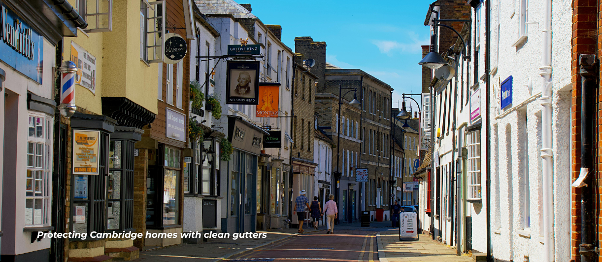 A Cambridge pedestrian street showing a collage of buildings that need their gutters cleaned.