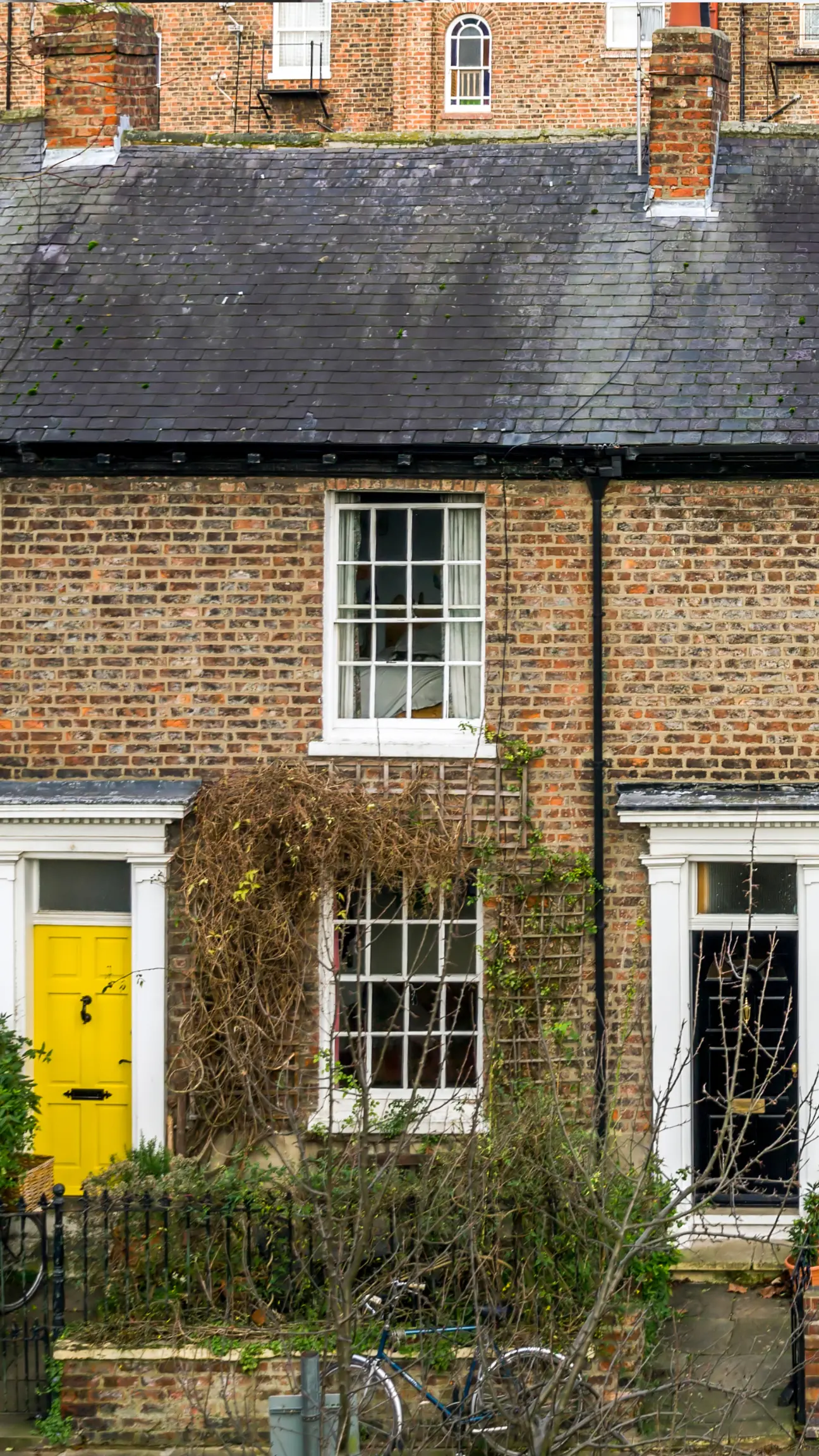 This image shows houses in Cheshire that need their gutters cleaned.