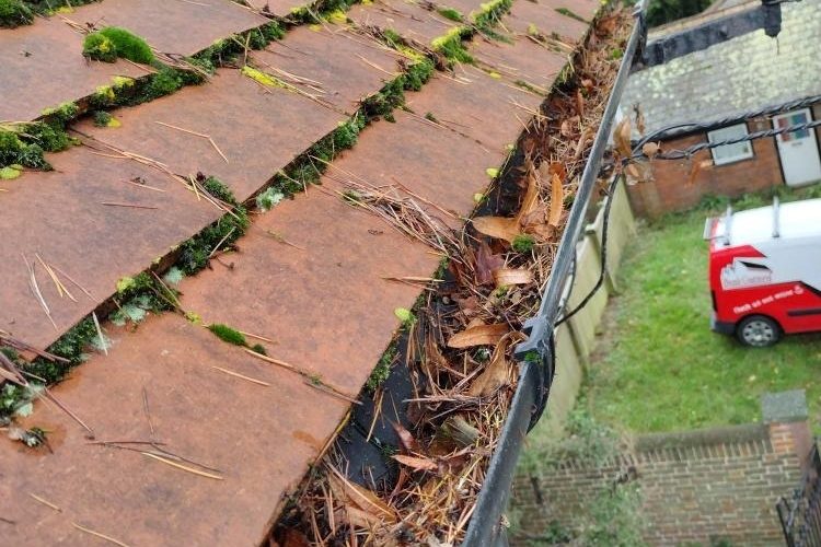 Before photo of a gutter cleaning job in Hampshire