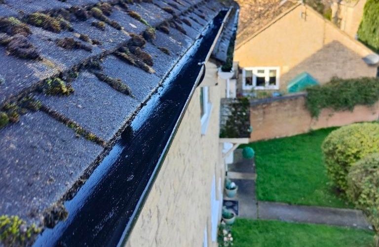 Before photo of a gutter cleaning job in West Sussex